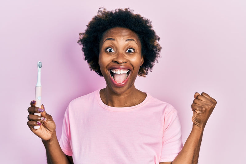 Woman smiles confidently with fresh breath